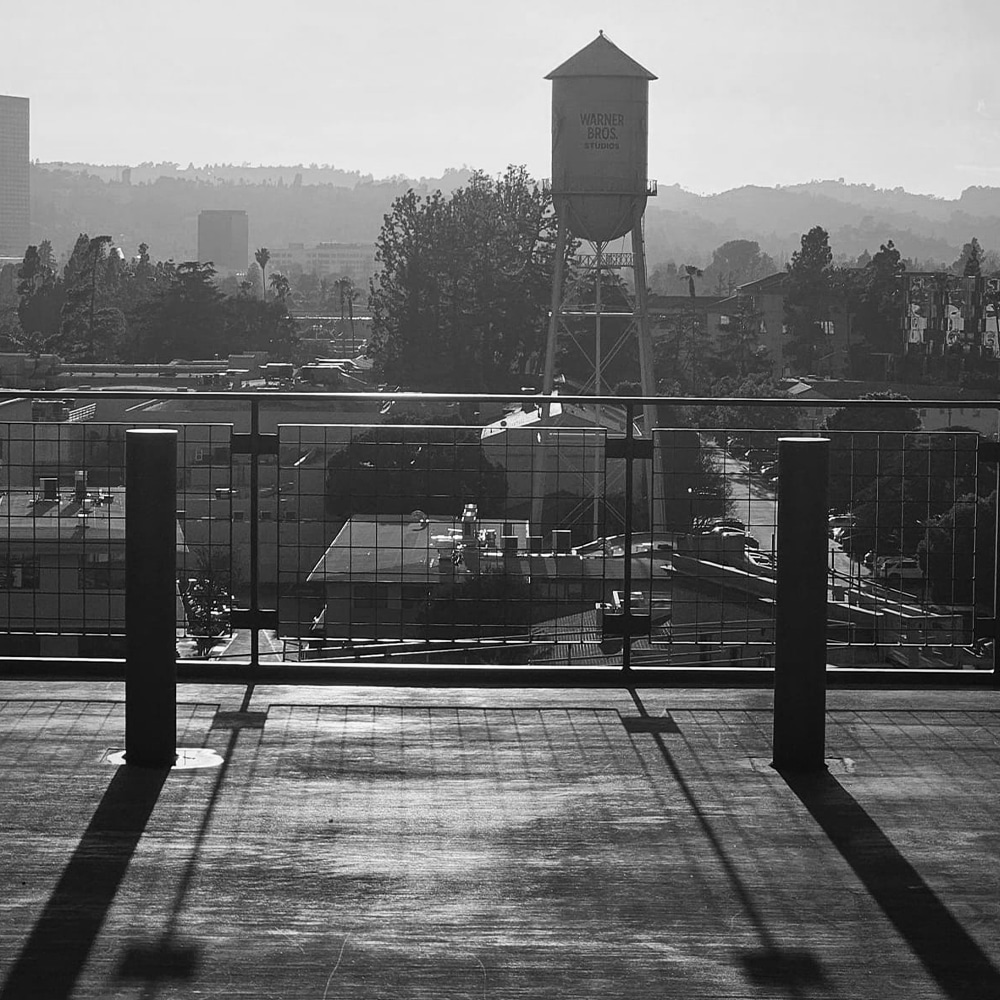 The Warner Bros. Studios lot with famous water tower at sunset.